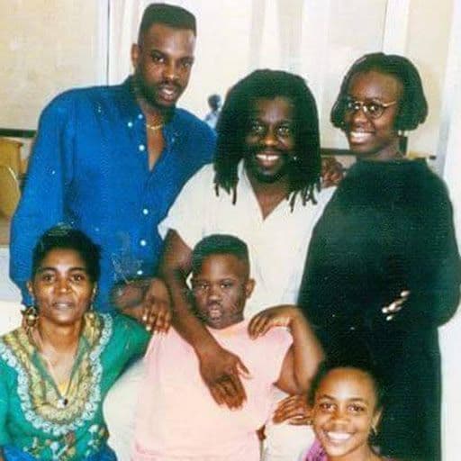 Mutulu Shakur (top-center) with family visiting at United States Penitentiary at Lompoc (California). Pictured are Mutulu’s children Mopreme (top left), Sekyiwa (top right), Nzinga (bottom right), Chinua (bottom center) and wife Makini (bottom left). Photo from the collection of Makini Shakur.
