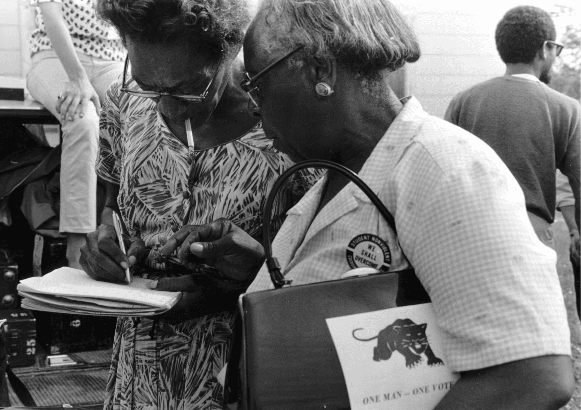 Mrs. Turner Signing Up Freedom Voters, Lowndes County, Alabama, 1966. Copyright © 1966, 1985, 2002 Bob Fletcher
