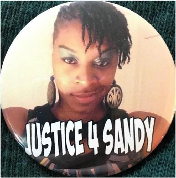 Figure 3 “Justice 4 Sandy” lapel pin that exhibit attendees received from Shante Needham, Sandra Bland’s sister. Author photo.